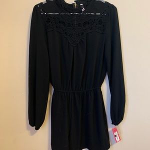 Black Romper! Beautiful lace detail on top!